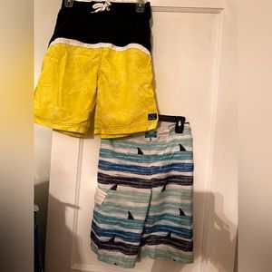 Cat Jack Shark swimsuit and Big chill black and lime swimsuit